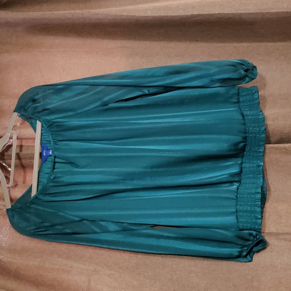 Emerald green blouse with sheer sleeves, keyhole opening in front